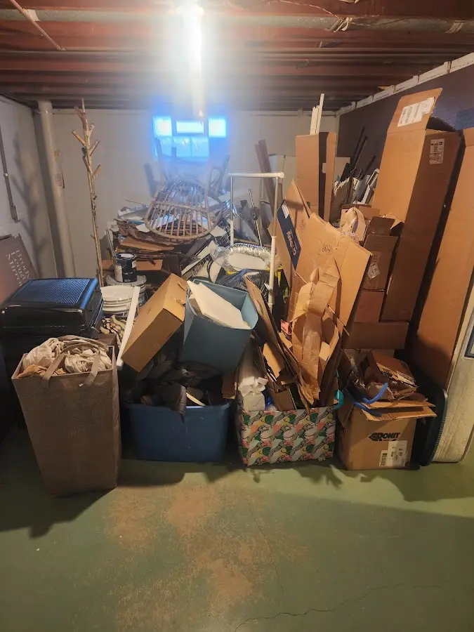 Roll-off dumpster container at job site for 8 Yard Dumpster Rental in Smyrna